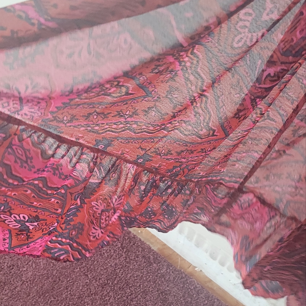 2 for 30 dresses.  Beautiful tunic top from torrid Size 1